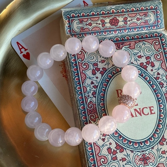 7” natural rose Quartz bracelet with rose gold color accent bead
